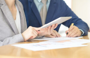 Successful young consultants working as business team in an offi